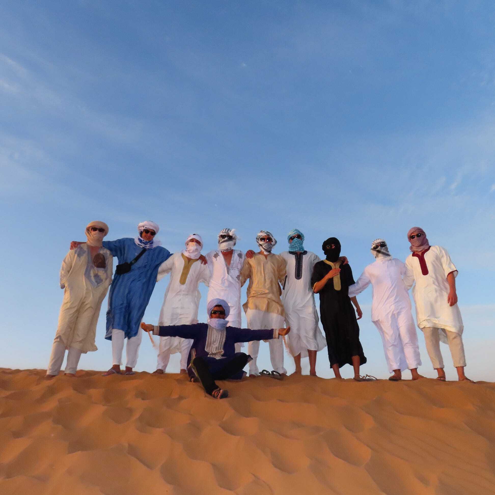 Group of travelers in the Moroccan desert
